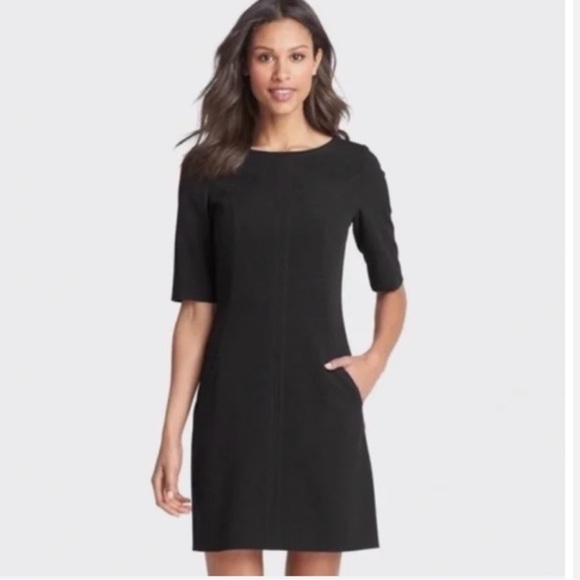 Tahari Dresses & Skirts - Tahari Black A lined dress with pockets & back zipper. Size 4P. Great Condition!